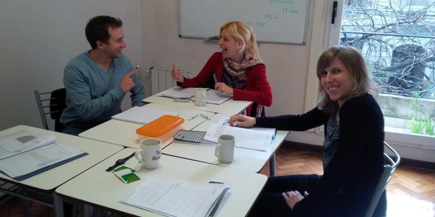 Three students participating in a Verbum mini group Spanish class
